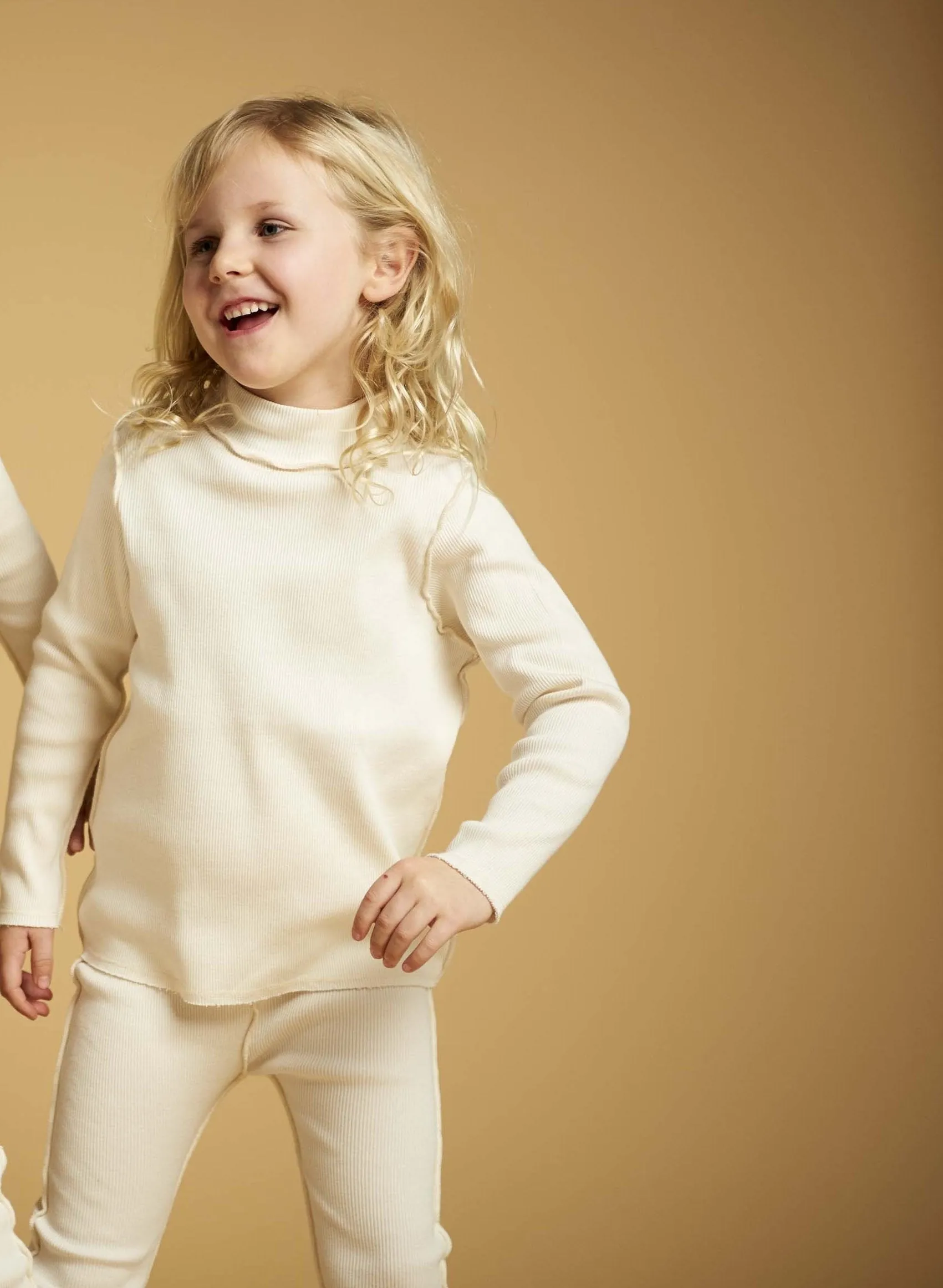 Versatile Ribbed Ivory Turtle Neck